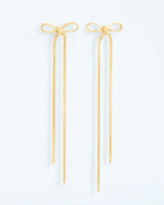 Textured stud earrings with statement bow