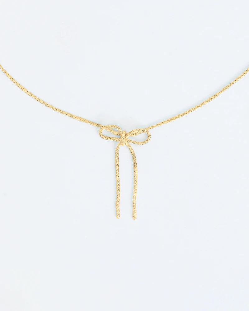 Textured necklace with small bow