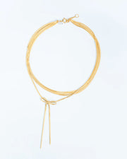 Layered necklace with statement bow