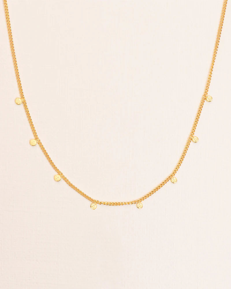 Necklace with hammered charms in 18 ct. gold