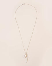 Necklace with leaves and pearl pendant