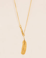 Long necklace with feather pendant