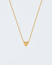 Necklace with heart-shaped hammered pendant