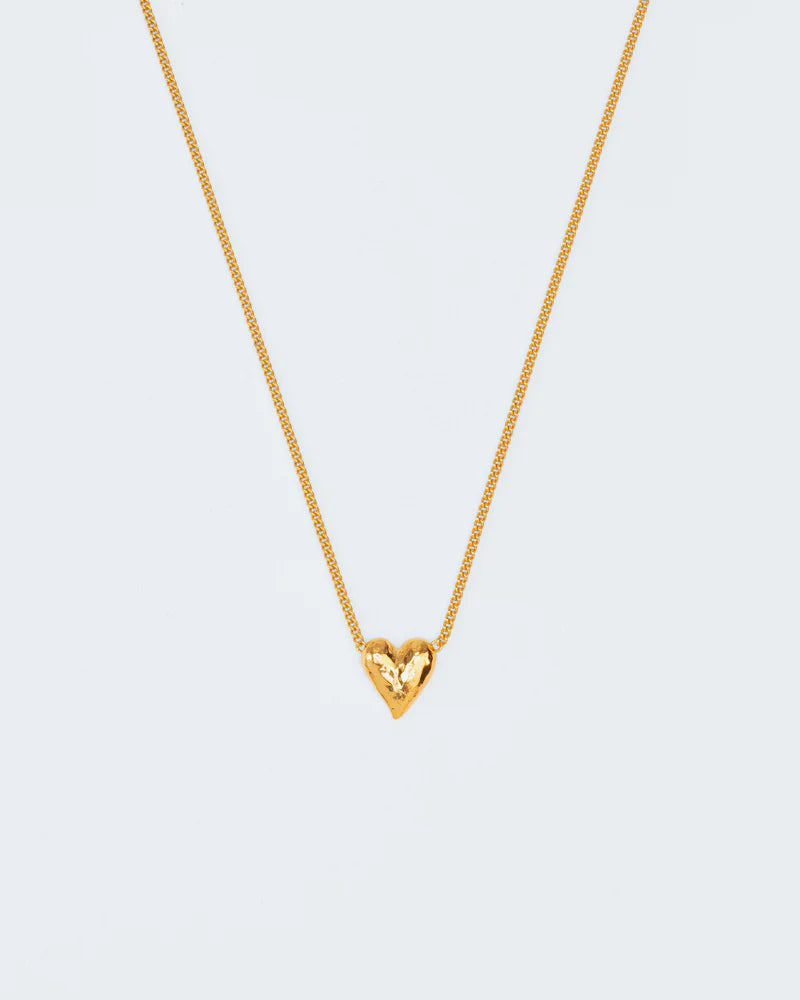 Necklace with heart-shaped hammered pendant