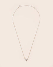 Necklace with heart-shaped hammered pendant