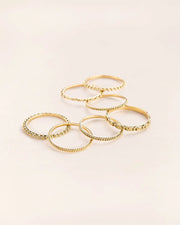 Set of seven stacked 'Chapters' rings in 18 ct. gold