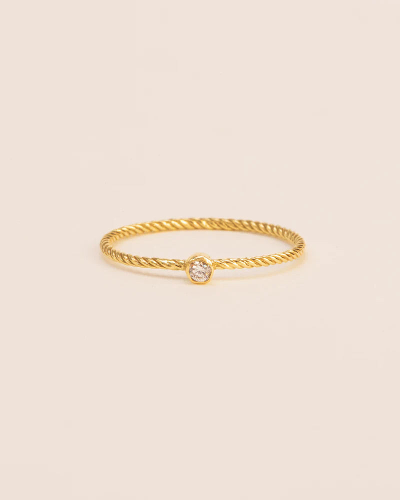 Twisted ring with white diamond in 18 ct. gold