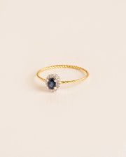 Ring with sapphire and diamond rosette in 18 ct. gold