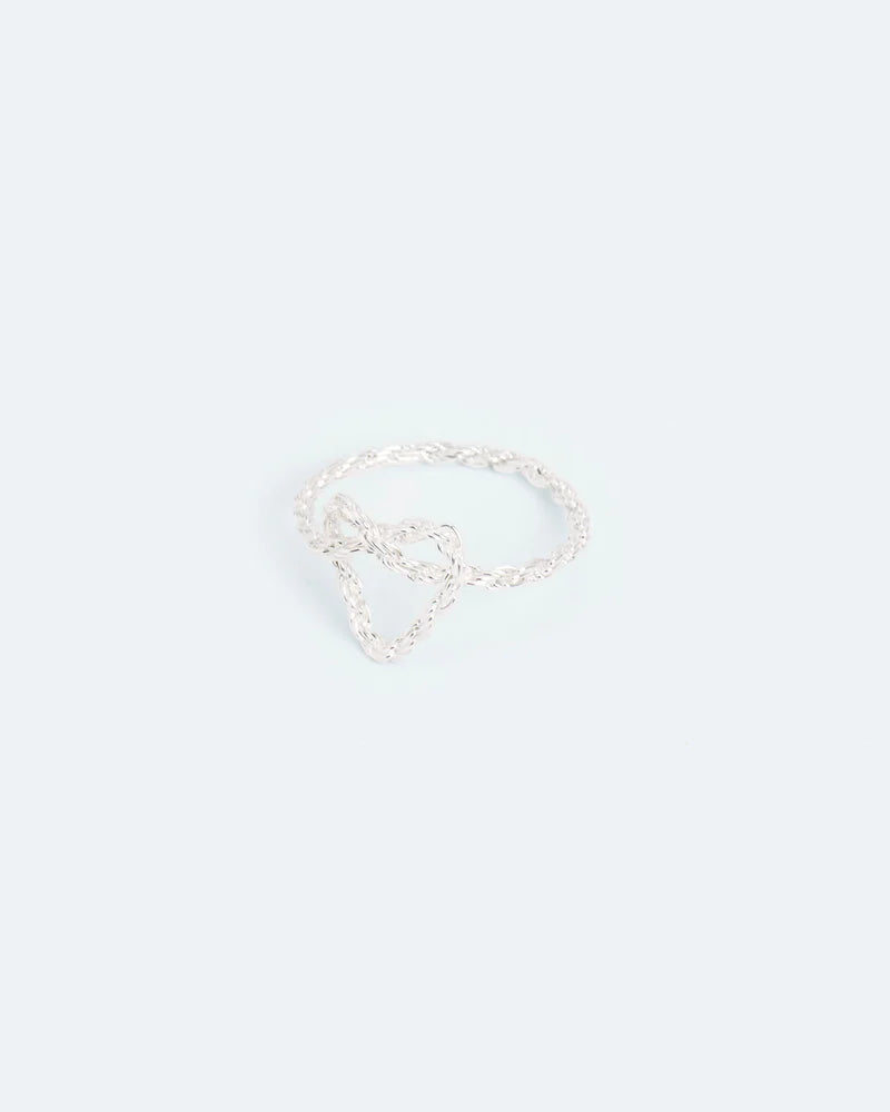 Intricate knotted heart ring
