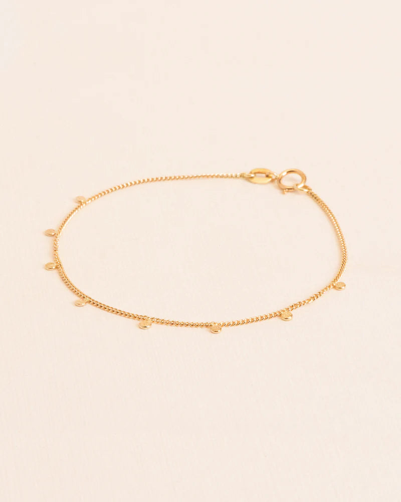 Bracelet with hammered charms in 18 ct. gold