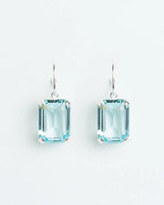 Hoop earrings with aquamarine and clear crystal trilogy