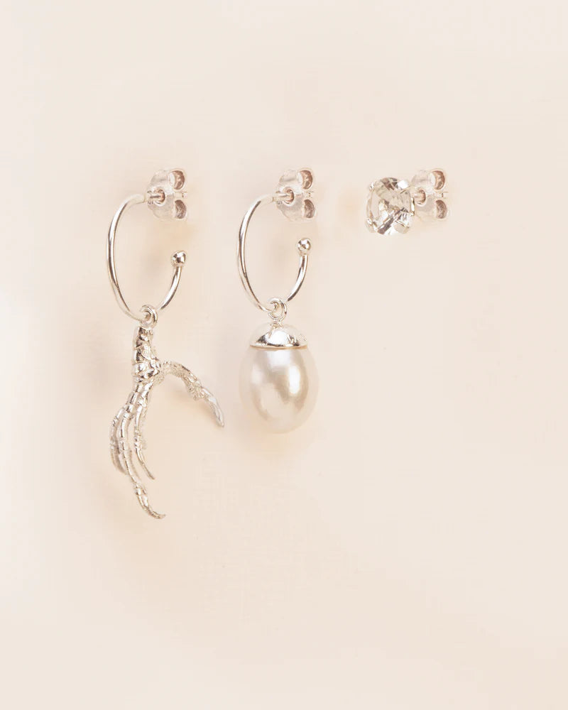 Trio of earrings with signature grigri, pearl and crystal