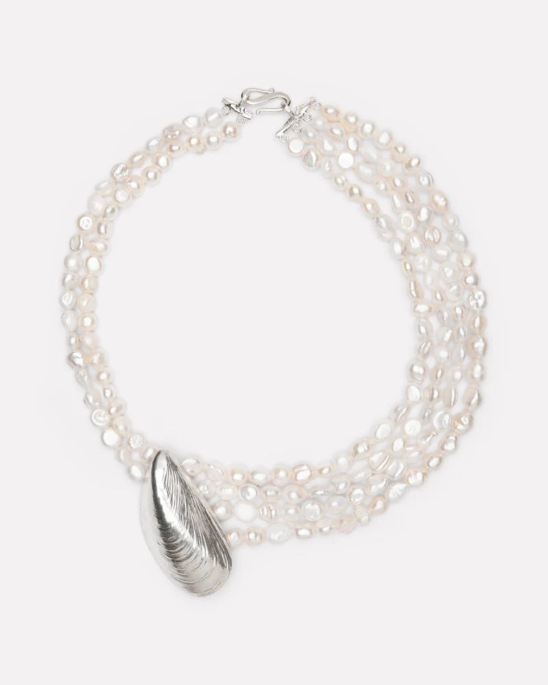 Long necklace with thorned pendant and freshwater pearl