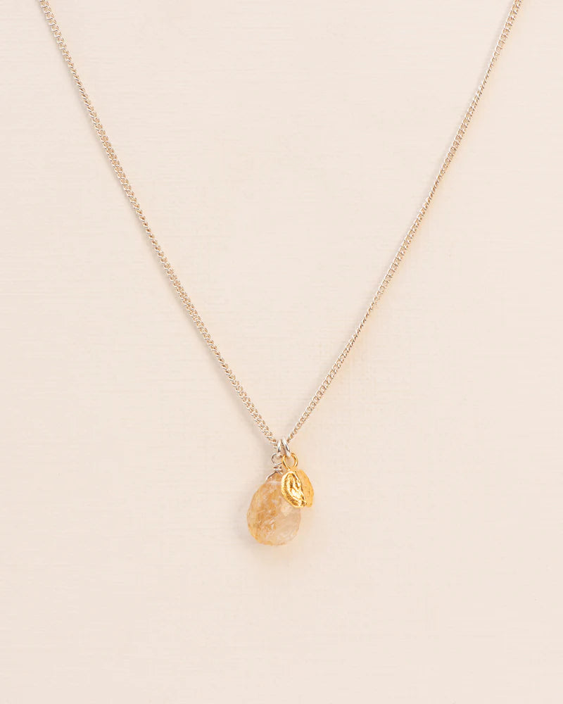 Necklace with rutilated quartz and mustard seed