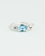 Ring with aquamarine and clear crystal trilogy
