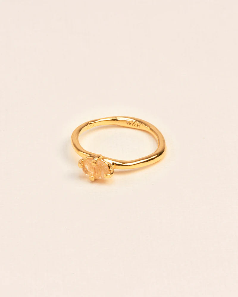Organic ring with rutilated quartz