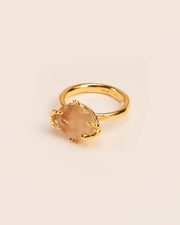 Organic ring with rutilated quartz