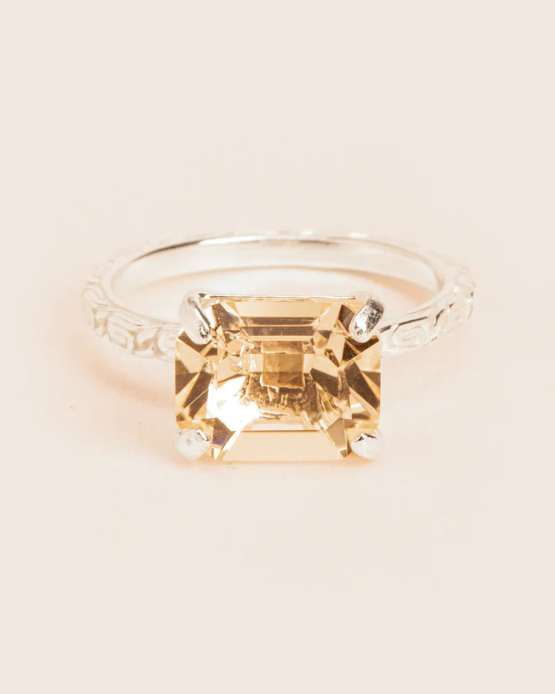 Ring with 'Chapters' texture and citrine crystal