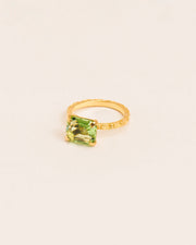 Ring with 'Chapters' texture and peridot crystal