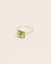 Ring with 'Chapters' texture and peridot crystal